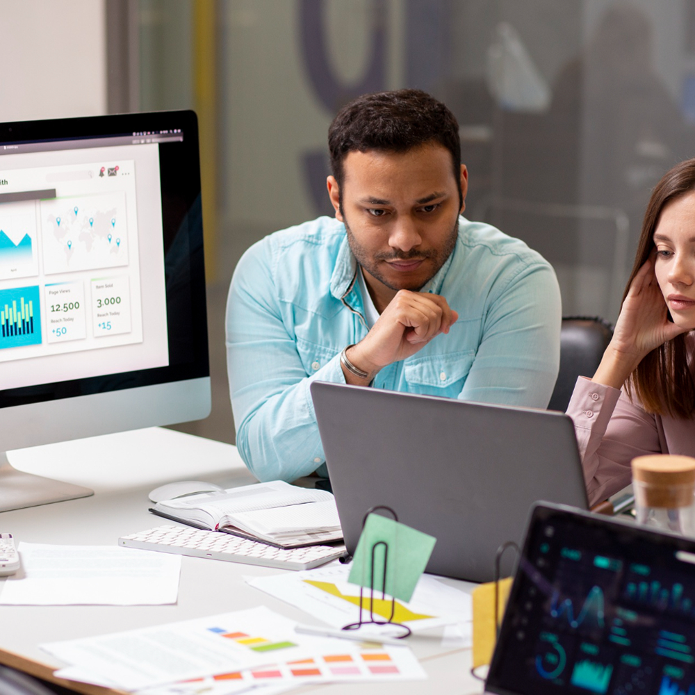 Business professionals analyzing data